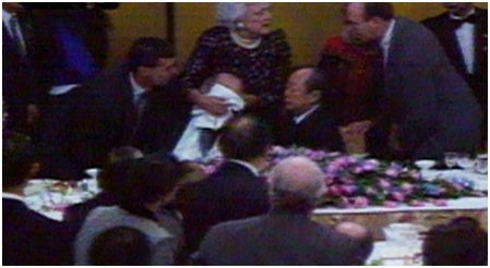 7 Mrs. Bush covered President Bush’s mouth. Source NHK TV